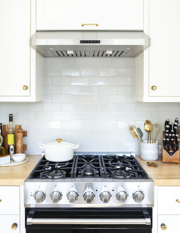 Recouvrir hotte de cuisine : astuces pour un nettoyage efficace